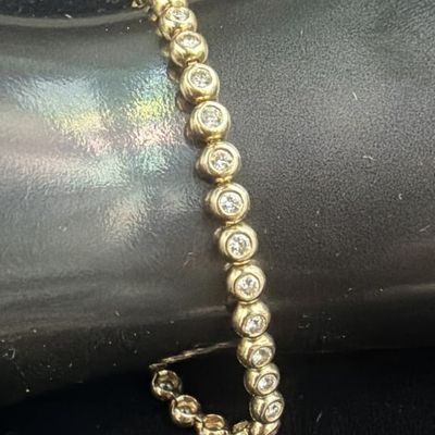 Beautiful Channel Set 14k Gold Diamond Bracelet.