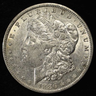 1886-O MORGAN DOLLAR AU
