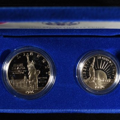 1986-S $1 & 50C COMMEMS STATUE OF LIBERTY
