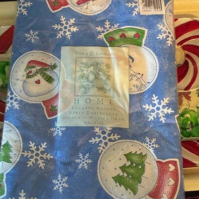 Sale Photo Thumbnail #886: Town & Country Home Snowglobe Tossed Flannel Backed Vinyl Tablecloth