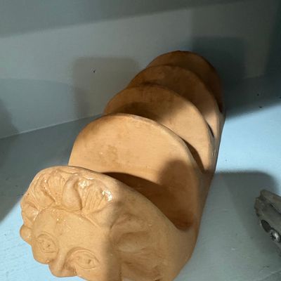 Sale Photo Thumbnail #656: Terracotta Sun Face Taco Holder