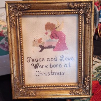 Sale Photo Thumbnail #351: Vintage Framed Cross Stitch "Peace and Love Were Born at Christmas"