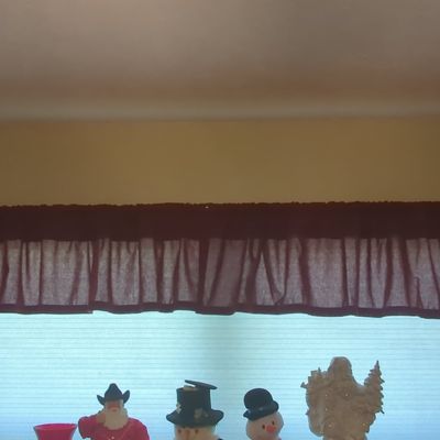 Sale Photo Thumbnail #642: Burgundy Rod Pocket Valance and Assorted Christmas Figurines