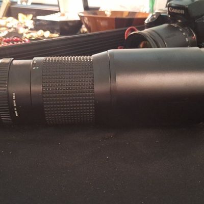 Sale Photo Thumbnail #219: Tokina  400mm f/5.6 Telephoto Lens