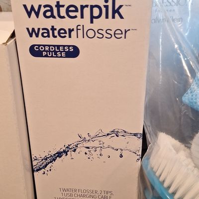 Sale Photo Thumbnail #285: Waterpik Cordless Pulse Water Flosser