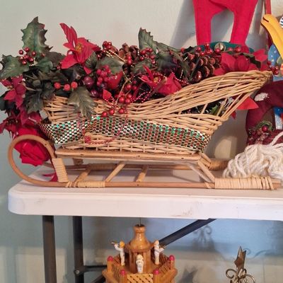 Sale Photo Thumbnail #585: Vintage Red Wicker Christmas Sleigh Centerpiece with Floral Arrangement