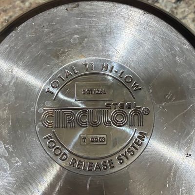 Sale Photo Thumbnail #153: Circulon Total Ti Hi-Low Steel 3-Quart Straining Saucepan