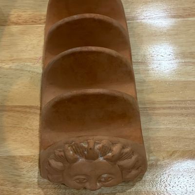 Sale Photo Thumbnail #599: Bentson-West Designs Terracotta Sun Face Taco Holder