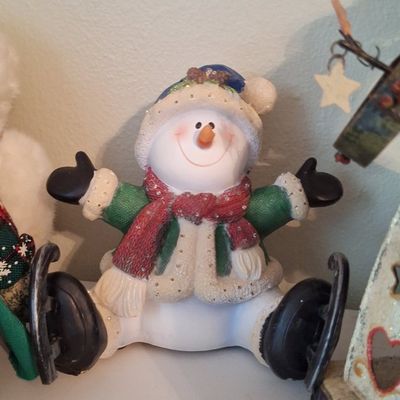 Sale Photo Thumbnail #692: Holiday Snowman Figurine with Ice Skates