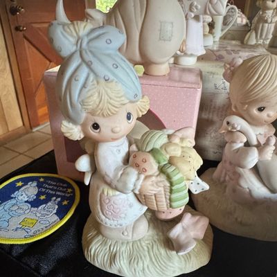 Sale Photo Thumbnail #818: Precious Moments 'Be Not Weary In Well Doing' Figurine