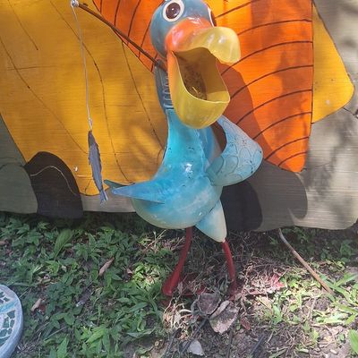 Sale Photo Thumbnail #118: Metal Pelican Garden Statue with Fishing Rod