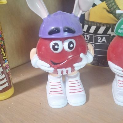Sale Photo Thumbnail #833: M&M's Red Character Easter Bunny Candy Dispenser with Purple Hat