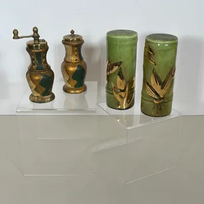 (4pc) TWO SETS OF MID-CENTURY SALT AND PEPPER SHAKERS
One set features an Italian Florentine hand-painted wood pepper mill with a brass...