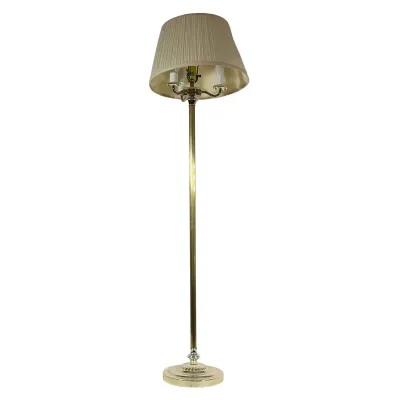 BRASS THREE-LIGHT FLOOR LAMP WITH PLEATED SHADE
Polished brass floor lamp featuring a fluted central column and a stepped, gadrooned...