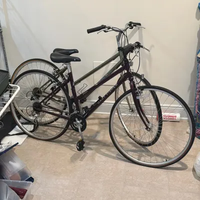 (2pc) GARY FISHER ZEBRANO AND TREK 720 MULTITRACK HYBRID BICYCLES
Two step-through frame hybrid bicycles including a purple Gary Fisher...