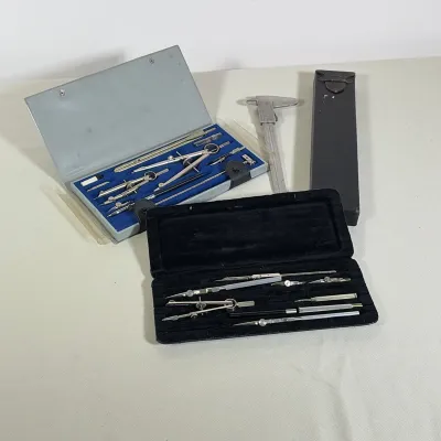 (4pc) KEUFFEL & ESSER SLIDE RULE AND CHARVOZ DRAFTING INSTRUMENTS
Grouping of vintage engineering tools including a Keuffel &...