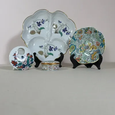 (4pc) COLLECTION OF DECORATIVE PORCELAIN TABLEWARE INCLUDING LIMOGES AND BELLEEK
A four-piece collection of decorative porcelain...