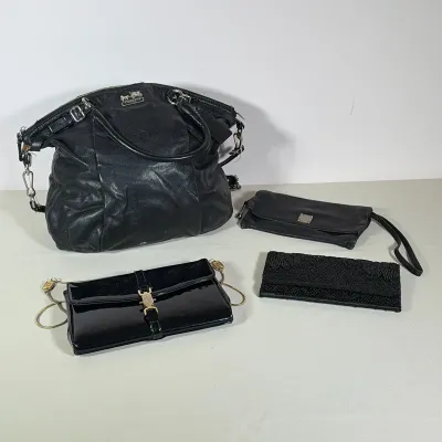 (5pc) GROUP OF FOUR BLACK HANDBAGS 
INCLUDING COACH, FRYE, AND ETIENNE AIGNER
This collection includes a Coach pebbled leather satchel...