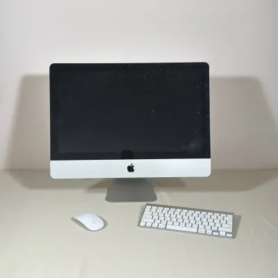 APPLE IMAC 21.5-INCH DESKTOP COMPUTER WITH KEYBOARD AND MOUSE
This Apple iMac desktop computer is constructed with a silver aluminum...