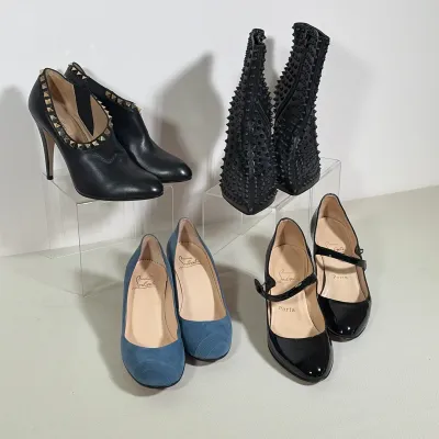 (4pc) CHRISTIAN LOUBOUTIN AND VALENTINO GARAVANI DESIGNER FOOTWEAR LOT
Collection includes three pairs of Christian Louboutin footwear...