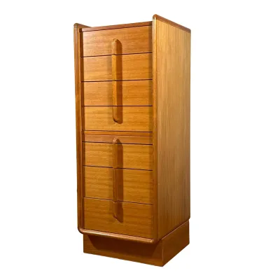 DANISH MODERN TEAK EIGHT-DRAWER TALLBOY DRESSER
Danish Mid-Century Modern tallboy dresser crafted in teak with a natural wood grain...