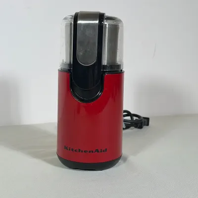 KITCHENAID MODEL BCG111ER BLADE COFFEE GRINDER IN EMPIRE RED
Electric blade coffee grinder featuring an Empire Red housing with black...
