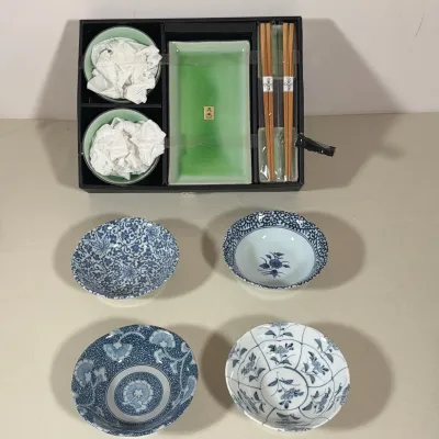 JAPANESE KAFUH CERAMIC SUSHI SET AND BLUE AND WHITE PORCELAIN BOWLS
A seven-piece ceramic sushi service including a green crackle-glaze...