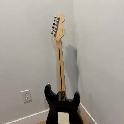 Sale Photo Thumbnail #27: Early 2000's, lefty guitar, rosewood fret boards, skunk stripe neck, works as should