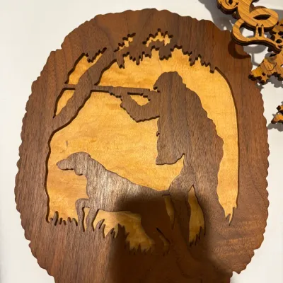 Sale Photo Thumbnail #156: Wooden hunting picture; working wooden dragon & cat wall clocks
