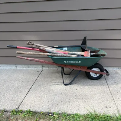 Sale Photo Thumbnail #381: Wheelbarrow of tools, tire doesn't hold air