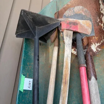 Sale Photo Thumbnail #383: Wheelbarrow of tools, tire doesn't hold air