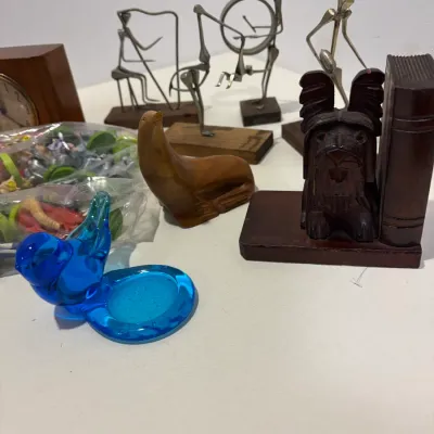 Sale Photo Thumbnail #298: Metal men figures, wooden clock, bookend, 1 set of Shrek chess pieces, 1 set of wooden chess pieces