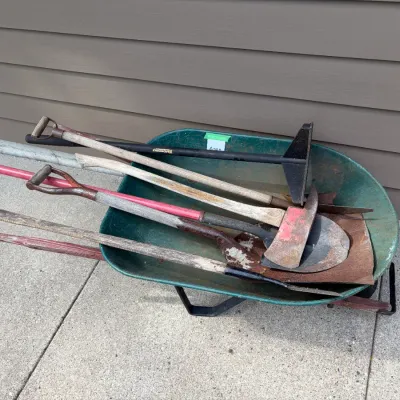 Sale Photo Thumbnail #382: Wheelbarrow of tools, tire doesn't hold air