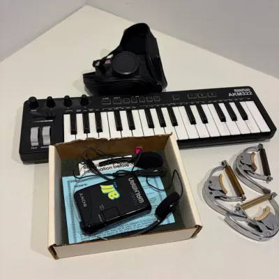 Sale Photo Thumbnail #349: Midiplus keyboard controller, guitar capos, Sony Walkman, camera