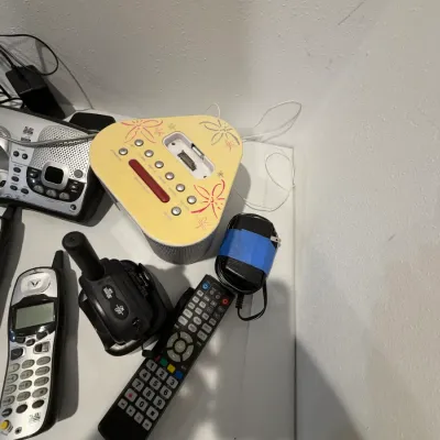 Sale Photo Thumbnail #231: Cordless phones, iPod dock, walkie talkie, universal remote
