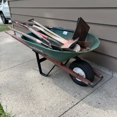 Sale Photo Thumbnail #380: Wheelbarrow of tools, tire doesn't hold air