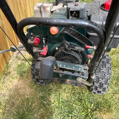 Sale Photo Thumbnail #400: Snow blower; has compression, unknown condition