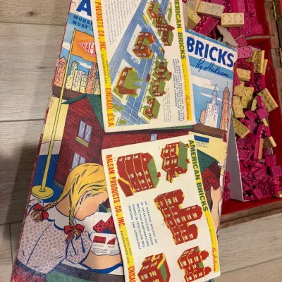 Sale Photo Thumbnail #12: Vintage wood pre-lego building blocks with paper roofs and advertising, storage box is older than bricks