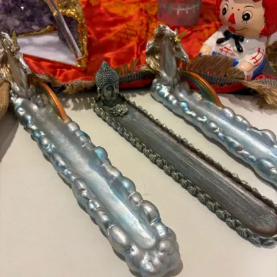 Sale Photo Thumbnail #284: 3 Incense holders, WWII pillow case, Halloween candle holder, Raggedy Andy pot, crystal dragon display, burlap sack tote