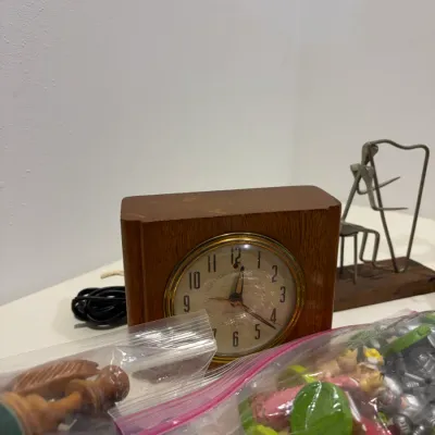 Sale Photo Thumbnail #295: Metal men figures, wooden clock, bookend, 1 set of Shrek chess pieces, 1 set of wooden chess pieces