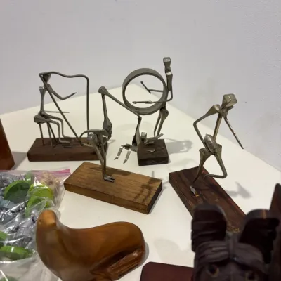 Sale Photo Thumbnail #299: Metal men figures, wooden clock, bookend, 1 set of Shrek chess pieces, 1 set of wooden chess pieces
