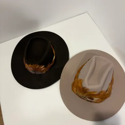 Sale Photo Thumbnail #99: 2 Feathered Cowboy Hats 