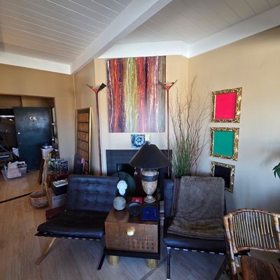 Mid-century Modern Barcelona Chairs Pair along with Cheryl Riley Side Table and marble lamp, Italian floor lamps, pottery barn faux fur...