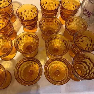 Vintage amber glass footed dessert or sherbet glasses and tumblers in the Whitehall (or Colony)