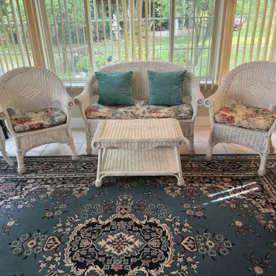 White wicker furniture set featuring 5 total pieces