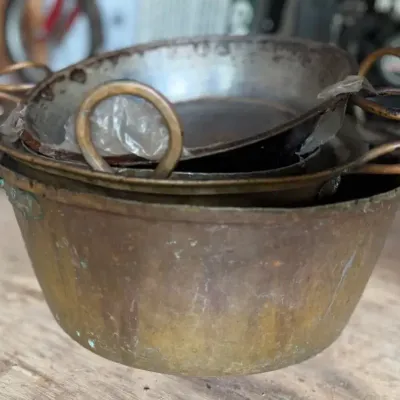 Set of vintage copper pots and pans  