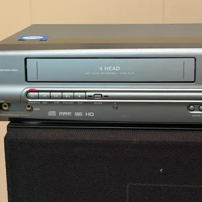 Magnavox MWD2205 4-Head VHS VCR/DVD Combo Player w/ Remote – Powers On