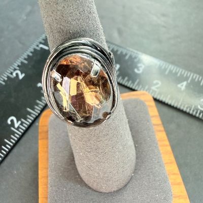 Black gemstone type center ring