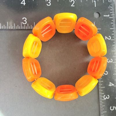 Orange and yellow stretch beaded bracelet