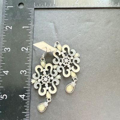 Beautiful silver tone dangle statement earrings